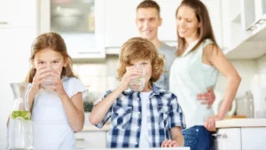 family drinking filtered water